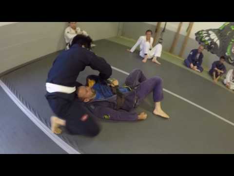 Bald man gets choked out