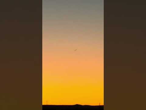 Cigar and Orbs over Arizona Desert.