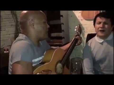Rick e Giovani cantando modão