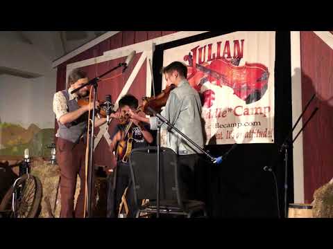 Miles Quale, Teo Quale and Tristan Clarridge play Roanoke