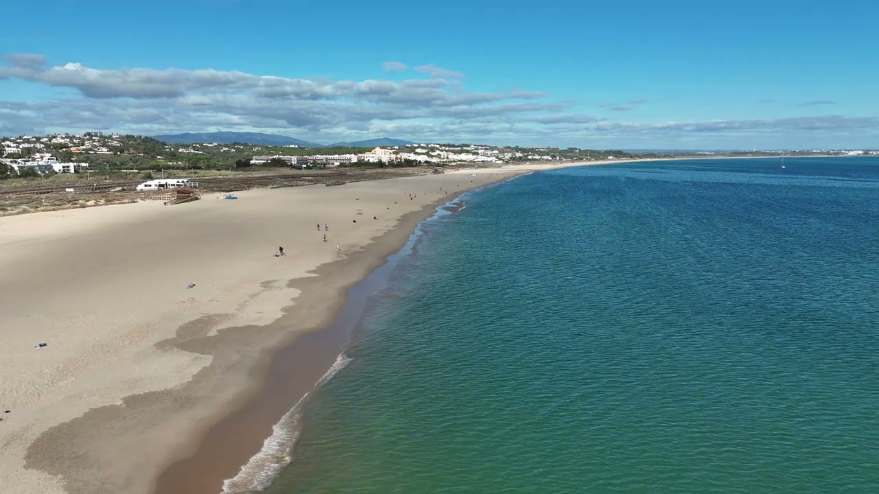 Discover the captivating aerial vistas of Meia Praia.