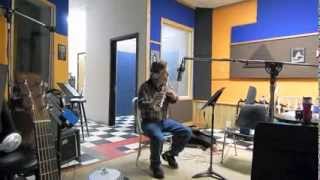 In a recording session playing Flute!