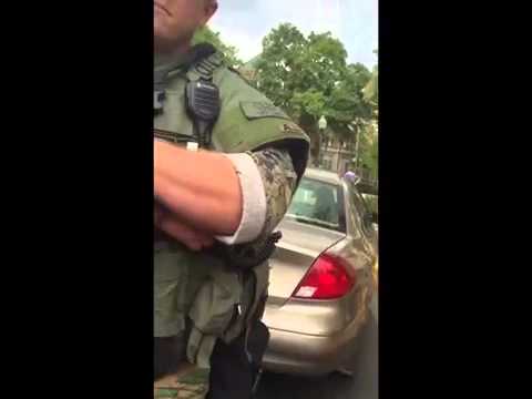 Man gets pulled over by armored car for flipping cops off