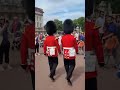 Make way. woman gets squashed between two of the queens guards #buckinghampalace