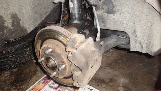 How to Replace Front Struts on a Ford Contour