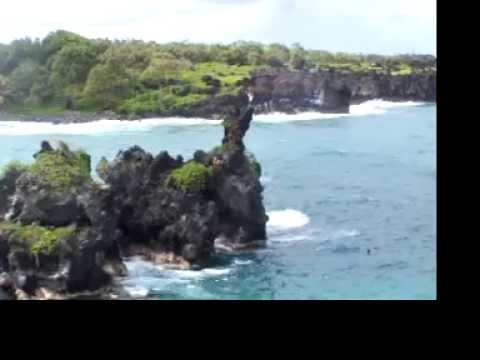 People jumping off rocks in Maui State Park