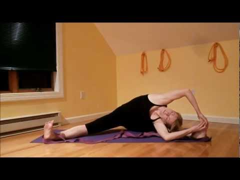 Parivrtta Upavistha Konasana practice using straps to revolve the spine