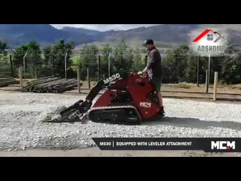 MS30 Mini Skidsteer with leveler Attachment In Action - Spreading G4 Material On Site