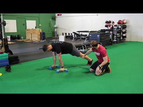 How To Perform The Slider Knee Tuck