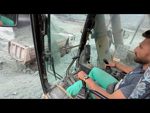 Caterpillar 385C Excavator Loading Trucks - Operator View