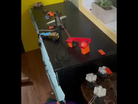 A Rube Goldberg machine that turns off the lights! #shorts #rubegoldbergmachine #dominoes