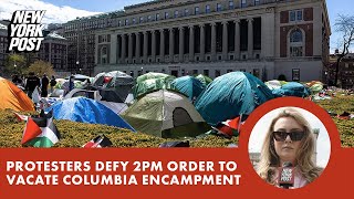 Columbia in chaos as hundreds of anti-Israel protesters defy order to vacate tent camp