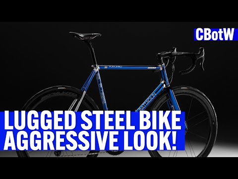 This STEEL BICYCLE WITH LUGS has an AGGRESSIVE RACING LOOK!
