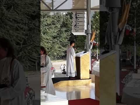 Fr.Li is praying the Rosary at Medjugorje