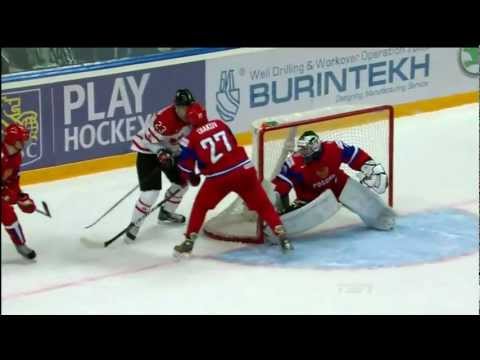 WJC - Nathan MacKinnon Crosschecks Kirill Dyakov. Dec 31st 2012