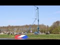 Arm hijskraan met grootste vlag Nederland in Emmeloord gebroken