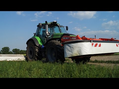 hqdefault Deutz Fahr WARRIOR z kosiarkami KUHN   wojownik w pierwszym pokosie   VIDEO