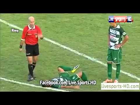 Doctor Falls over when running onto the pitch