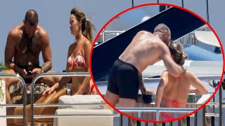 Conor McGregor shares a kiss with fiancee Dee Devlin as they show off their affections on yacht