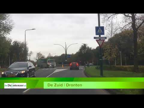 Bewoners De Zuid lopen de polonaise: omleggen weg naar achterkant Open Hof is van de baan Bewoners De Zuid lopen de polonaise: omleggen weg naar achterkant Open Hof is van de baan