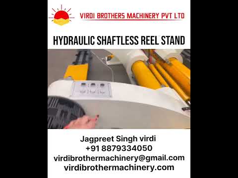 Hydraulic shaftless mill reel stand