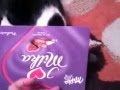 Cat eating Milka chocolate 