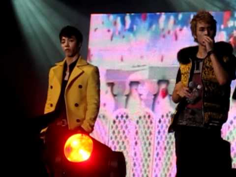 Dongwoon drinks while Kikwang stones (MULA)