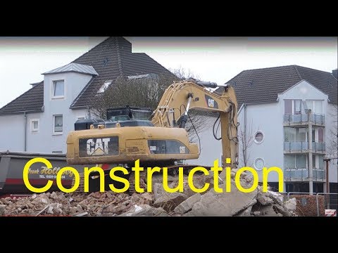 Excavator CAT 336D load truck