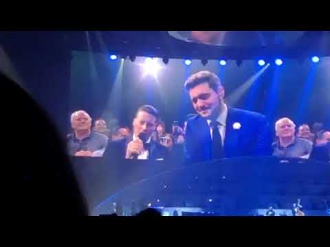 Audience member Carl-Henrik Nilsen singing Stardust with Michael Bublé