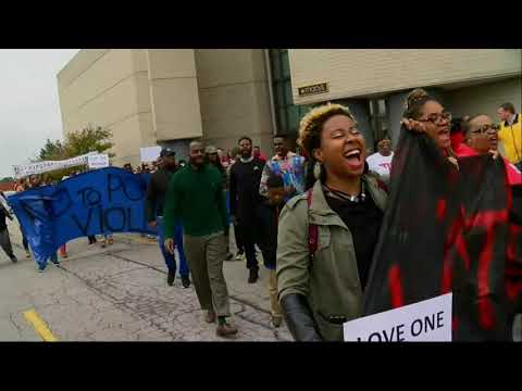 Protesters on Saturday marched through an Alabama shopping mall where police killed a black man they later acknowledged was not the triggerman in a Thanksgiving night shooting that wounded two people. (Nov. 24)