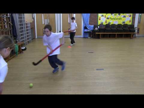 Primary PE Lesson plan ideas for teachers.  Hockey - Halfway Pass