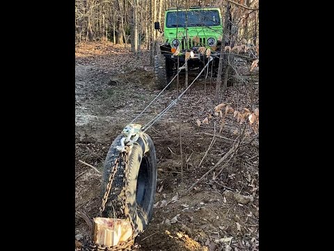 Stump Extraction using Harbor Freight Winch, Snatch Block, and Jeep.