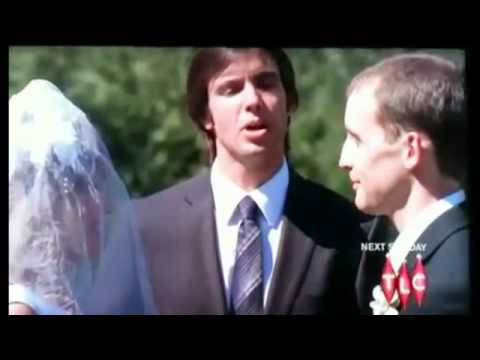 Couple kiss for the first time at their wedding.flv