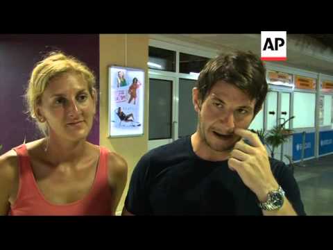 Costa Allegra passengers board planes for journey home