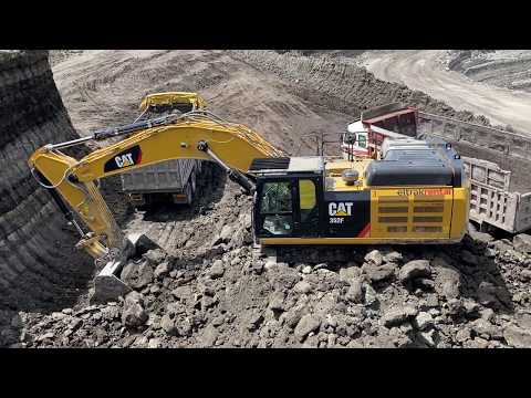 Caterpillar 352F Excavator Loading Trucks