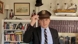 Chapeau Short: why do military hats have that strap on the front