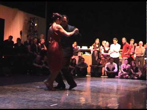  Esteban Moreno  and  Claudia Codega  are  dancing  to  the  tango  "  Amurado  "