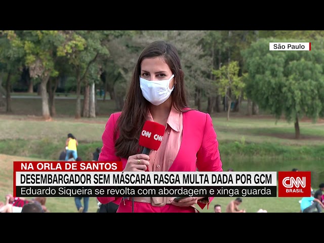 Desembargador é multado por se recusar a usar máscara em praia de Santos