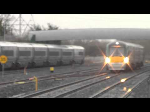 Irish Rail 22000 DMU 22038 passes and 22050 arrives at Hazelhatch