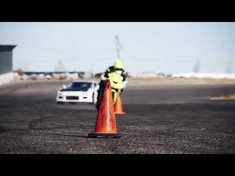 ICON - Motorcycle vs. Car Drift Battle