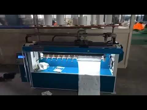 Semi-computerized flat semi computerised transfer knitting