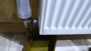 How to remove and replace a central heating radiator for decorating.