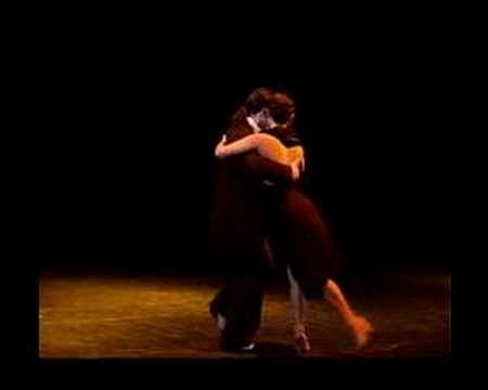  Dana Frigoli  and  Pablo Villarraza  are  dancing  to  a  tango