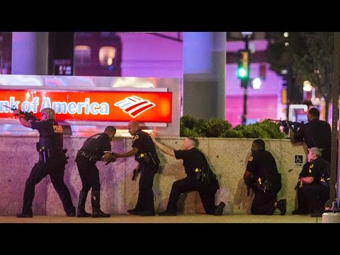 Click to Watch the The RACE WAR has started! Open warfare between black militants and police in Dallas video