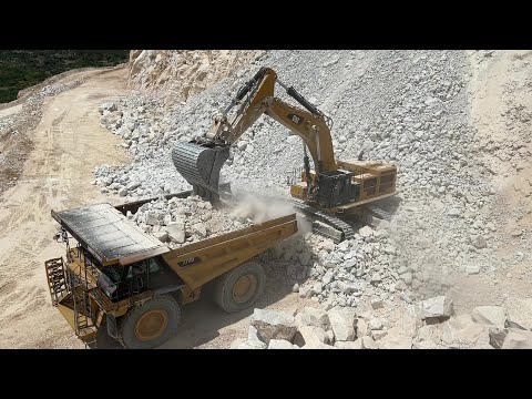 Caterpillar 390D Excavator Loading Caterpillar 777D Dumpers - Vugiukli SA Quarries - 4k
