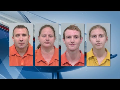 Children rescued after 4 family members accused of caging, abusing adopted and foster children