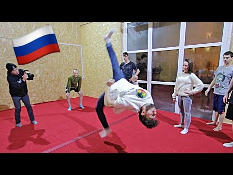 30 LARGE Men Doing FLIPS In a TINY ROOM in Russia!
