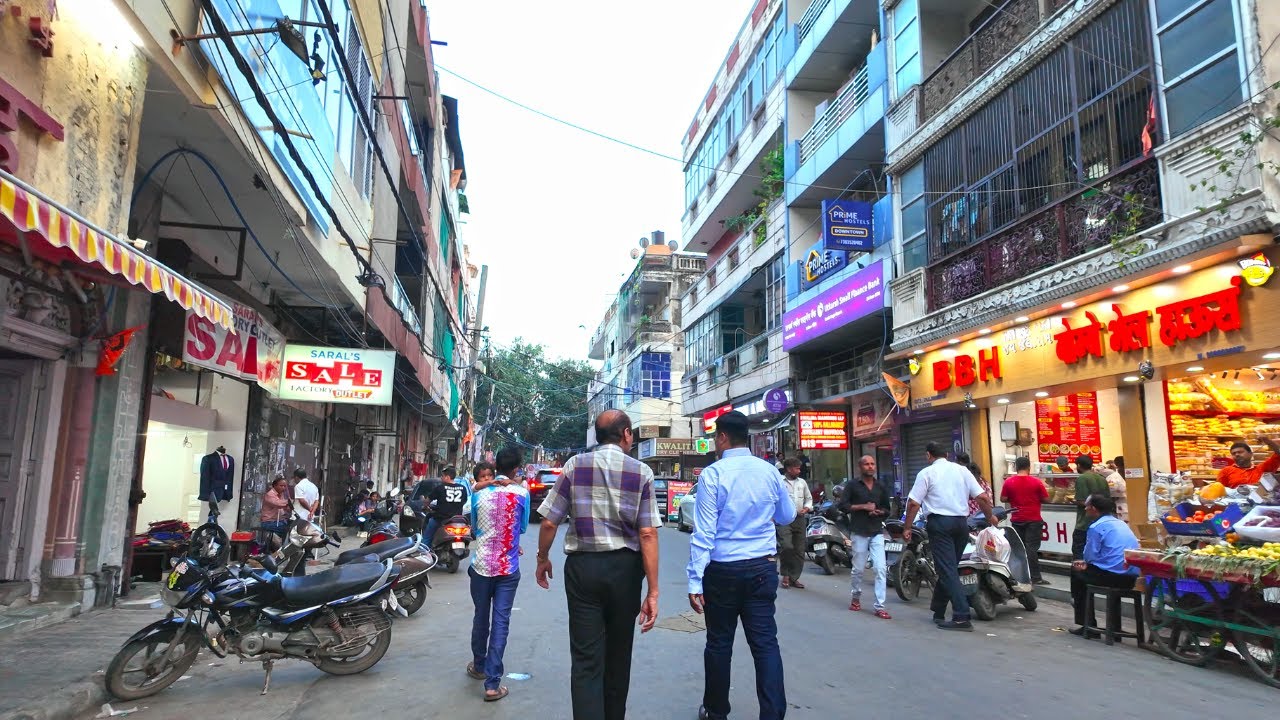 Immersive street-level walking tour through New Delhi (Market 6), India, showcasing authentic urban landscapes, local architecture, and the vibrant atmosphere of the city's neighborhoods
