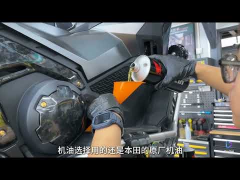 Honda XADV750 off-road scooter installation of saddlebags and oil maintenance