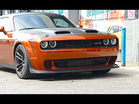 ***Brand New*** Challenger Hellcat with a Borla Atak exhaust system.. Stock tips